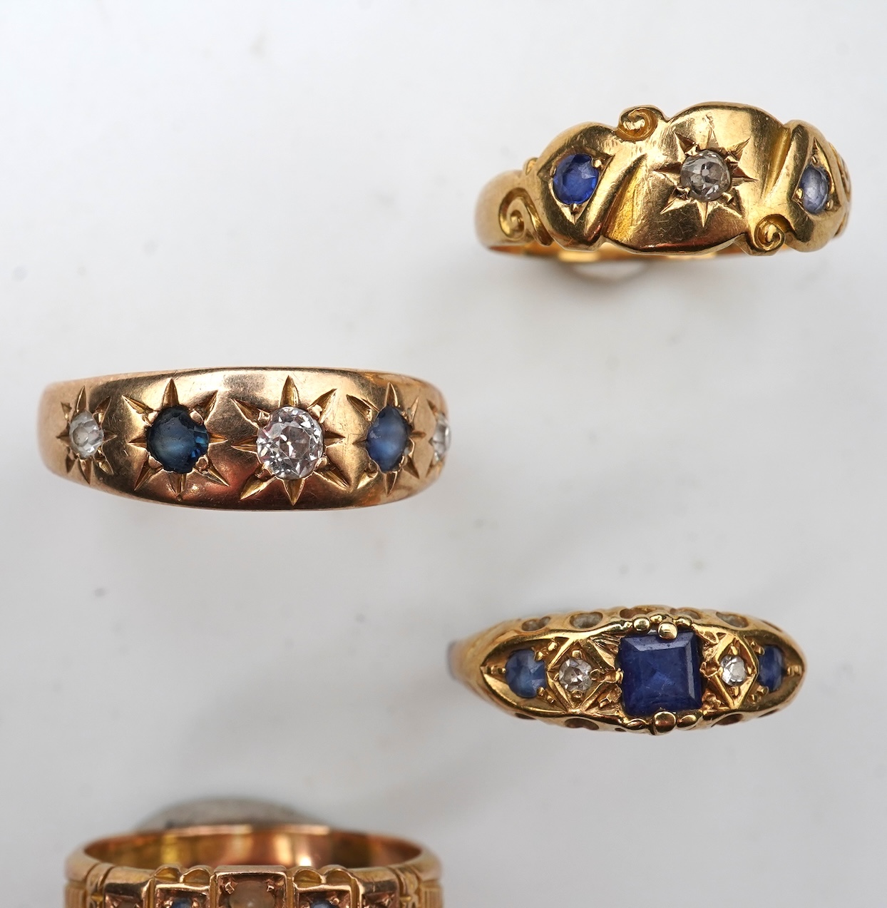 A group of four sapphire rings, late 19th/early 20th century